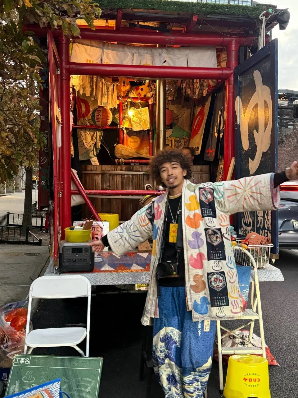 Mobile sento — red truck converted into a portable bathhouse